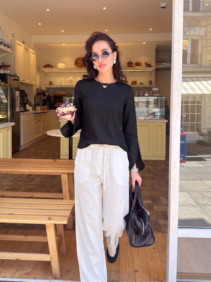 Slit Sleeve Blouse - Black worn — editorial