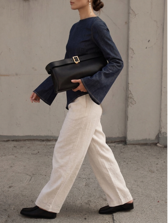 Denim Asymmetric Tie Bell-Sleeve Top worn — editorial