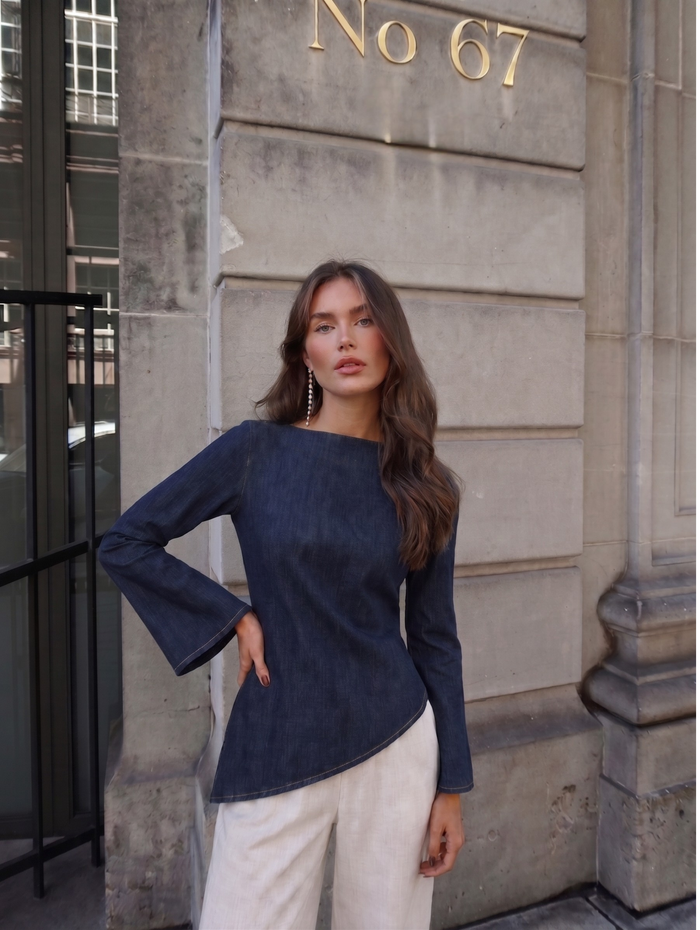 Denim Asymmetric Tie Bell-Sleeve Top worn — editorial